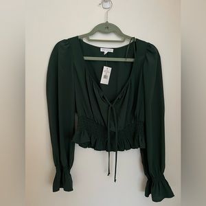 Socialite women’s green long sleeve top